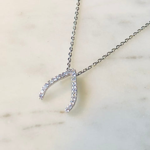 Sterling silver wish-bone and cubic zirconia necklace.