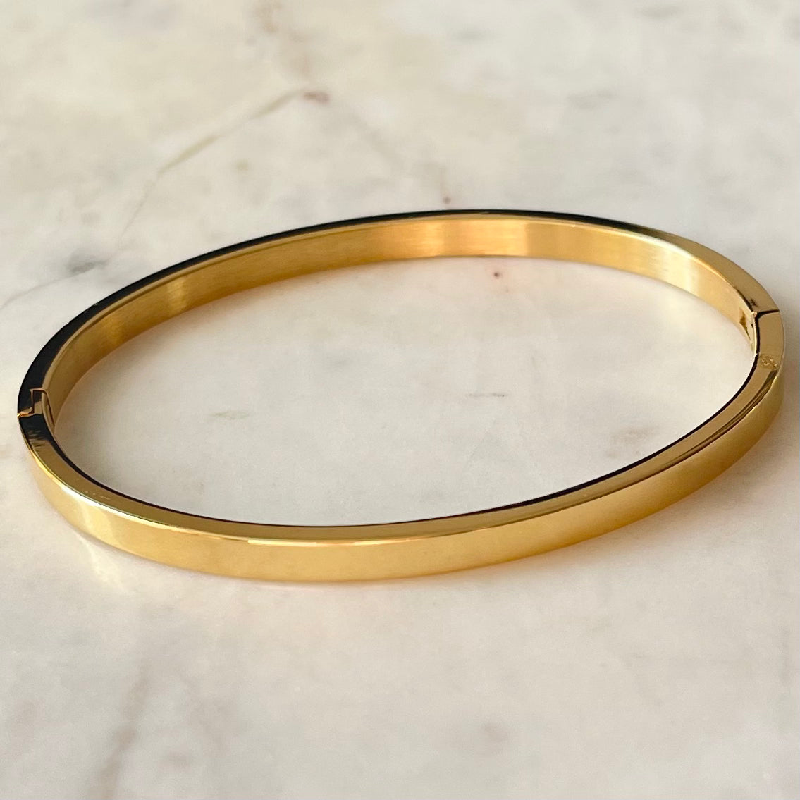 Gold Bangle with CZ Detailing