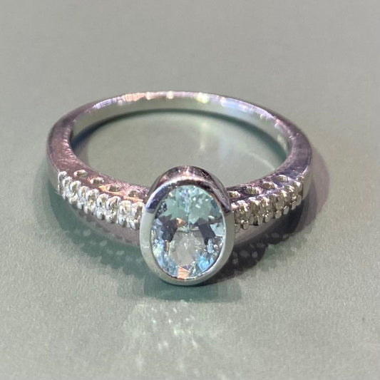 Oval Aquamarine and Diamond Ring