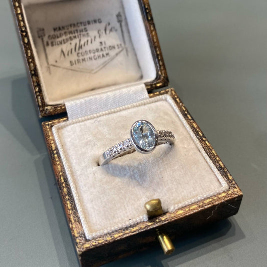 Oval Aquamarine and Diamond Ring