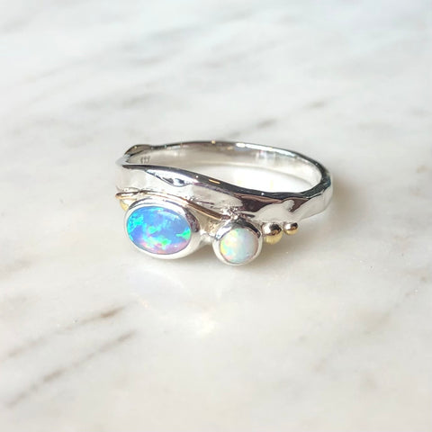 Silver blue and white opal ring.