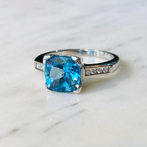 Blue Topaz and Diamond Ring.